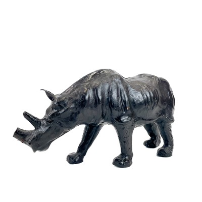 Lot 99 - A Liberty style leather clad model of a rhino.