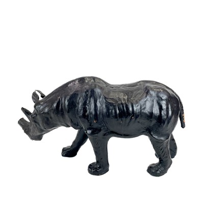 Lot 99 - A Liberty style leather clad model of a rhino.