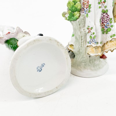 Lot 882 - A pair of Sitzendorf porcelain figures.