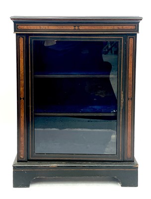 Lot 1859 - A Victorian ebonised walnut inlaid pier cabinet with brass mounts and boxwood stringing.