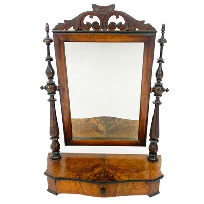 Lot 1876 - A late 19th century walnut toilet mirror.