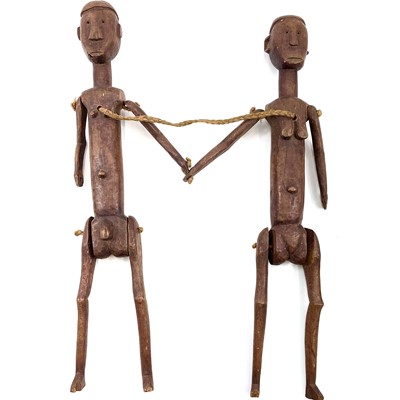 Lot 428 - 20th Century East African Nyamweze marionette twins from the studio of John Miller.