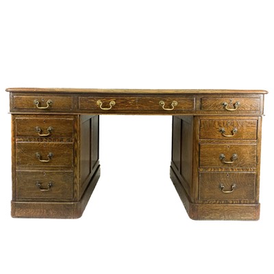 Lot 1879 - A Victorian oak pedestal desk.