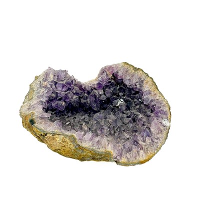 Lot 106 - A geode section of amethyst.