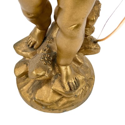 Lot 86 - A French spelter figure of Cupid.