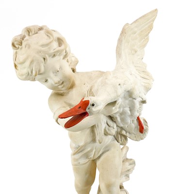 Lot 87 - A plaster figure of a boy with a goose.