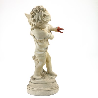 Lot 87 - A plaster figure of a boy with a goose.