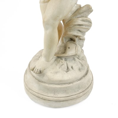 Lot 87 - A plaster figure of a boy with a goose.