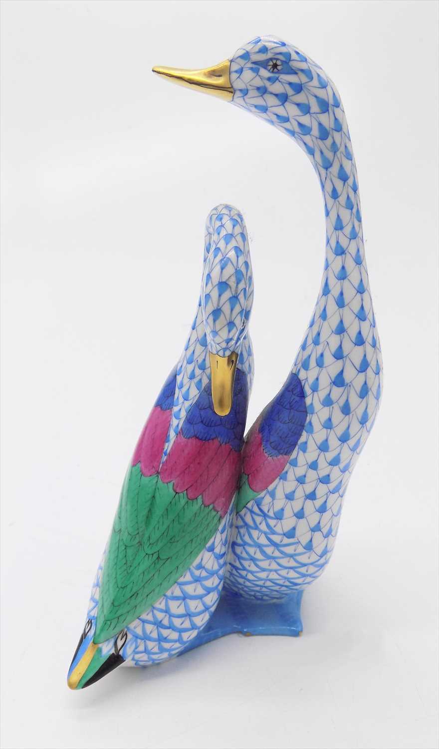 Lot 1379 - A Herend porcelain duck group.