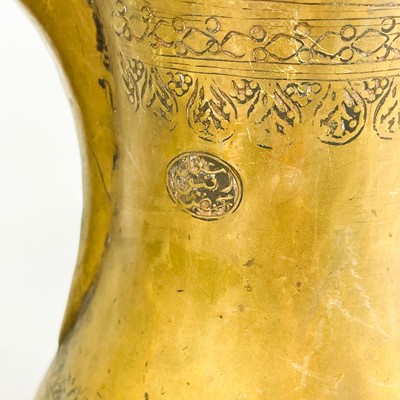 Lot 29 - Two Saudi Arabian brass dallah pots, 19th century.