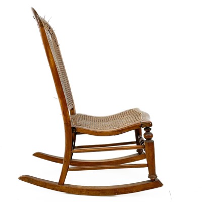 Lot 1890 - A late 19th century Bergere rocking chair.