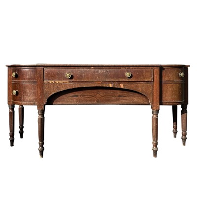 Lot 1916 - A late George III mahogany and rosewood banded sideboard.