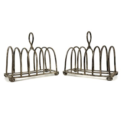 Lot 35 - A pair Victorian silver six section toast racks by Hukin & Heath Ltd
