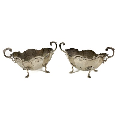 Lot 28 - A pair of Victorian silver twin handled salts.