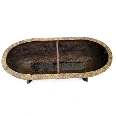 Lot 200 - A Ransome cast iron pig trough.