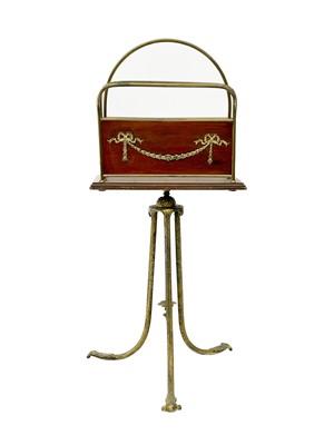 Lot 103 - An Edwardian mahogany and brass mounted revolving magazine stand.