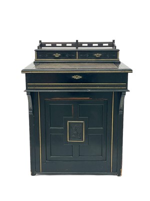 Lot 1828 - A Victorian Aesthetic ebonised and gilt davenport.