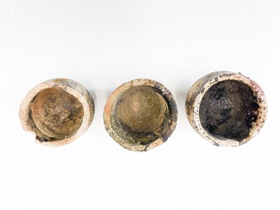 Lot 213 - Three small ceramic tin smelting crucibles.