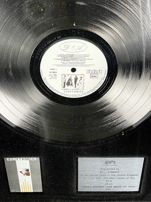 Lot 367 - Eurythmics BPI platinum disc.