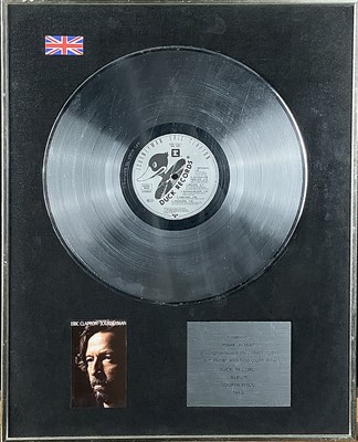 Lot 204 - Eric Clapton platinum disc.