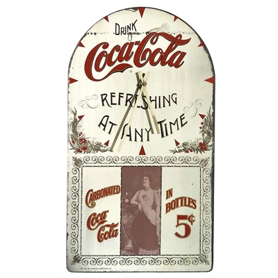 Lot 129 - A Coca-Cola advertisement mirror clock.