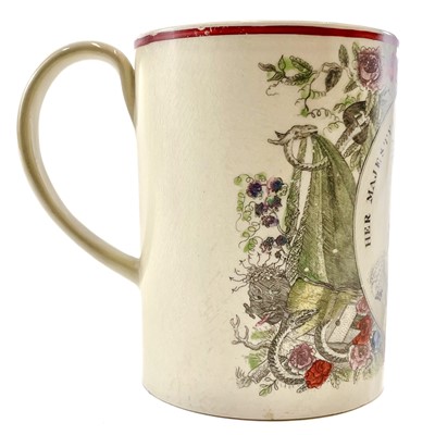 Lot 108 - A Queen Caroline creamware commemorative mug.