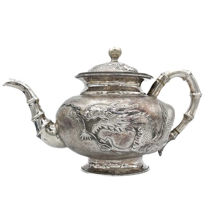 Lot 3 - A Chinese silver three-piece tea service, late 19th century.