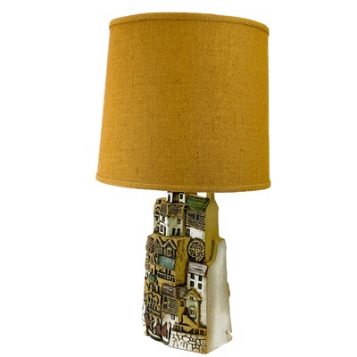 Lot 930 - A Tremaen pottery large village table lamp.