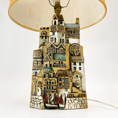 Lot 930 - A Tremaen pottery large village table lamp.