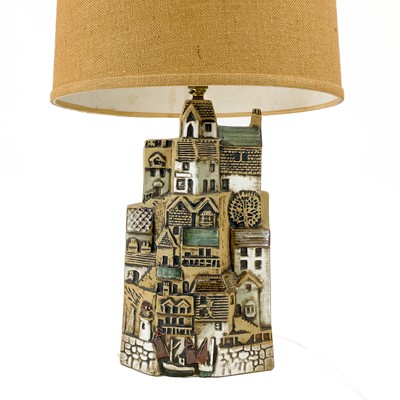 Lot 930 - A Tremaen pottery large village table lamp.