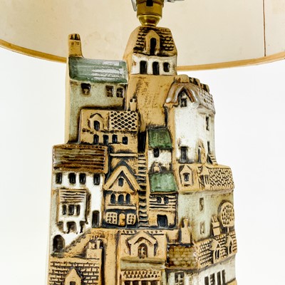 Lot 930 - A Tremaen pottery large village table lamp.