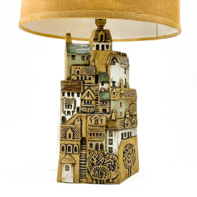 Lot 930 - A Tremaen pottery large village table lamp.