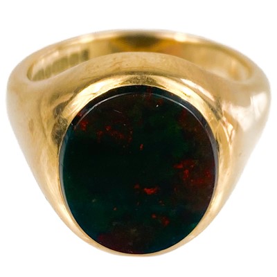 Lot 237 - A 9ct and blood stone set gentleman's heavy signet ring.