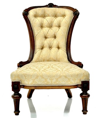 Lot 1841 - A Victorian walnut upholstered nursing chair.