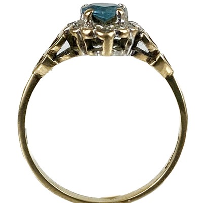 Lot 64 - A 9ct diamond and blue stone cluster heart shaped ring.