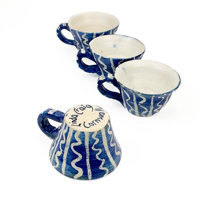 Lot 829 - Four studio pottery teacups by Linda Craig.