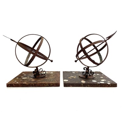 Lot 39 - A pair of wrought iron and brass mounted armillary spheres.