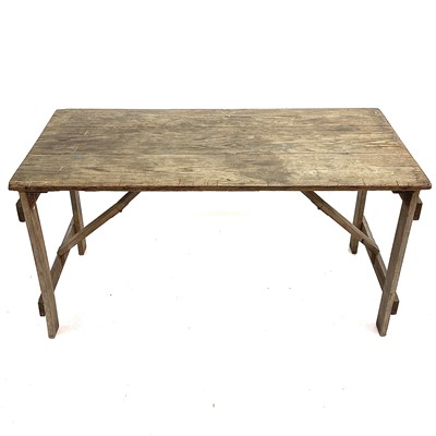 Lot 149 - An ash folding trestle table.