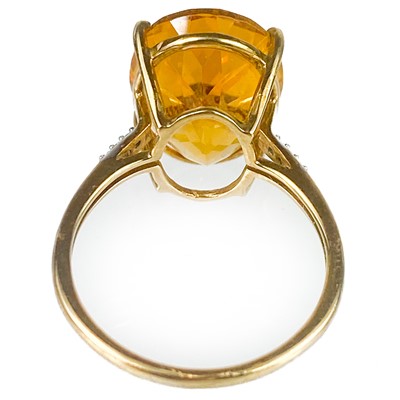 Lot 121 - A contemporary 9ct Rio golden citrine and diamond dress ring by Gemporia.