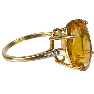 Lot 121 - A contemporary 9ct Rio golden citrine and diamond dress ring by Gemporia.