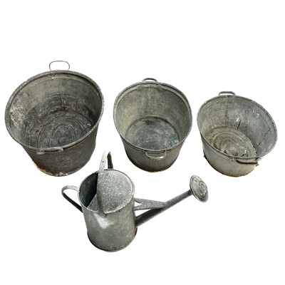 Lot 176 - Three tin baths and a galvanised watering can.