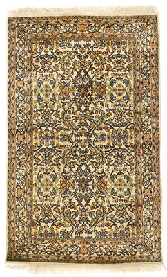 Lot 168 - A Persian silk rug, mid 20th century.