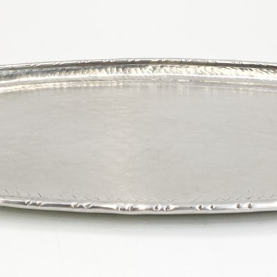 Lot 25 - An Art and Crafts stainless steel tray by Hugh Wallis.