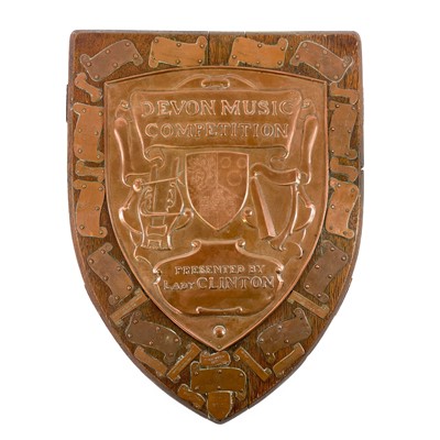 Lot 80 - A Newlyn copper trophy shield for the Devon Music Competition.
