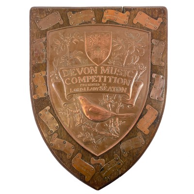 Lot 100 - A Newlyn copper trophy shield for the Devon Music Competition