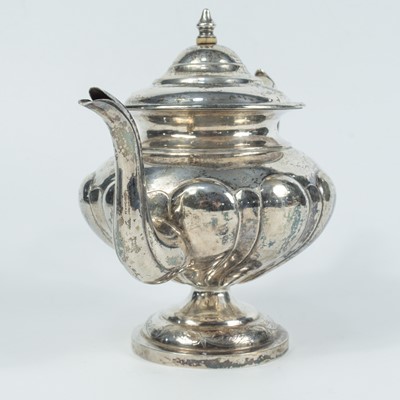 Lot 7 - A Chinese silver teapot, circa 1900.