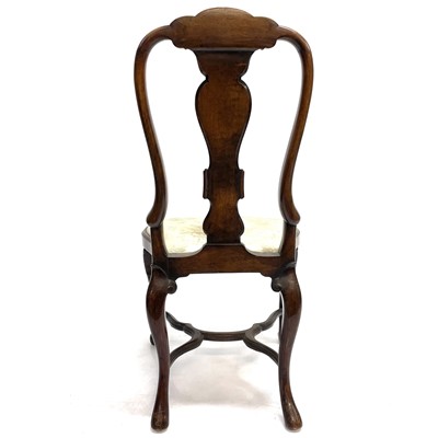 Lot 15 - A George I style walnut, shell carved and inlaid dining chair.