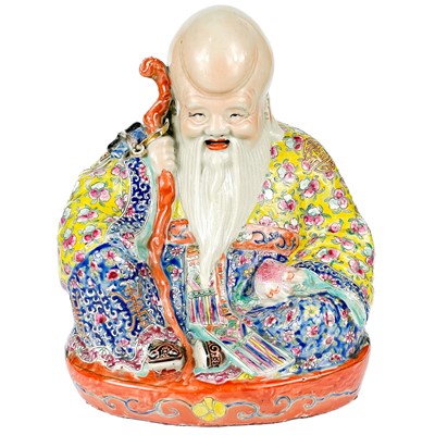 Lot 15 - A Chinese famille rose porcelain model of a seated Shoulao, 20th century.