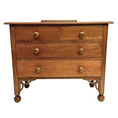 Lot 136 - An oak chest of two short and two long drawers.