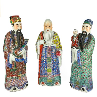 Lot 16 - Three Chinese famille rose porcelain figures of The Immortals, 20th century.